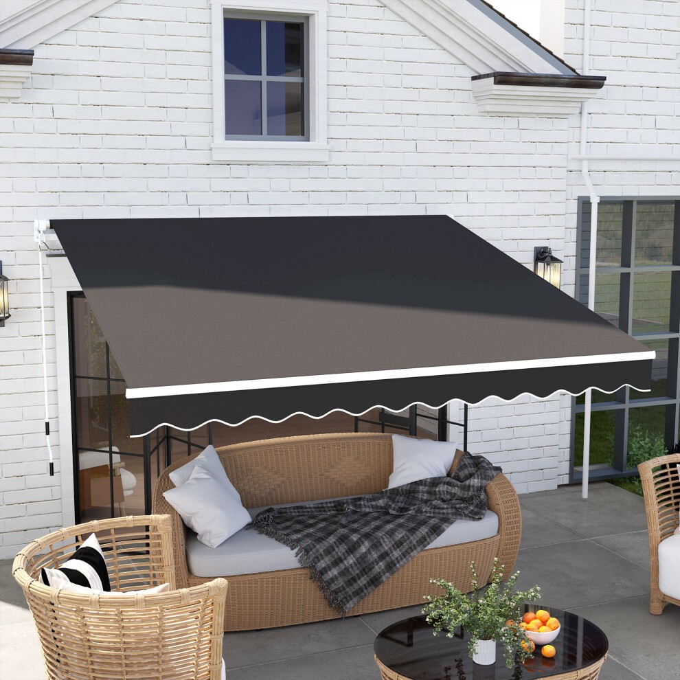 Black canopy sun shade shelter measuring 2.95 x 2.5m, featuring a crank handle and a scalloped edge, positioned over a patio seating area against a white brick wall.