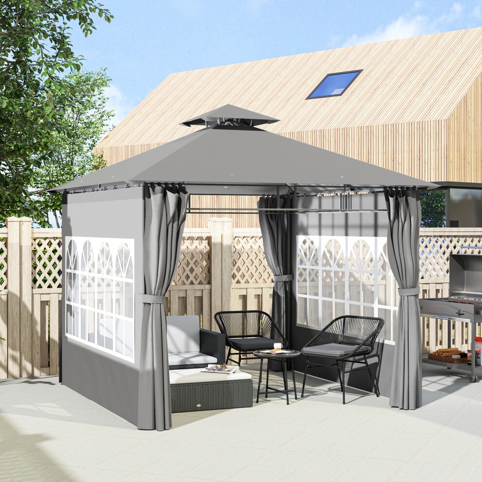 Light grey outdoor gazebo canopy shelter featuring a peaked roof, side curtains, and decorative window panels, set in a garden with seating and a wooden fence backdrop.