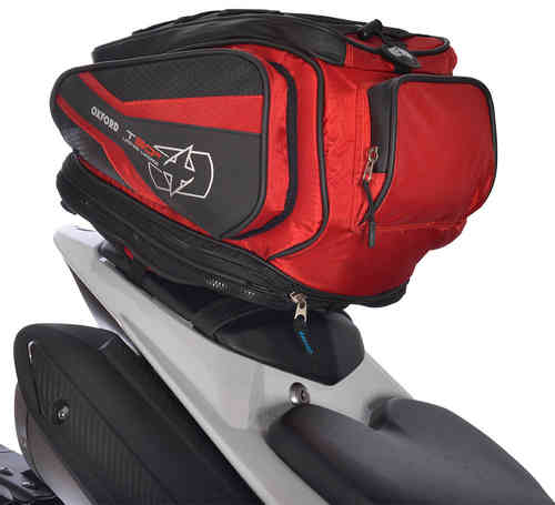 Red and black Oxford OL336 Tail Bag with a sleek design, featuring a zippered compartment, logo detail, and a durable exterior, mounted on a motorcycle seat.