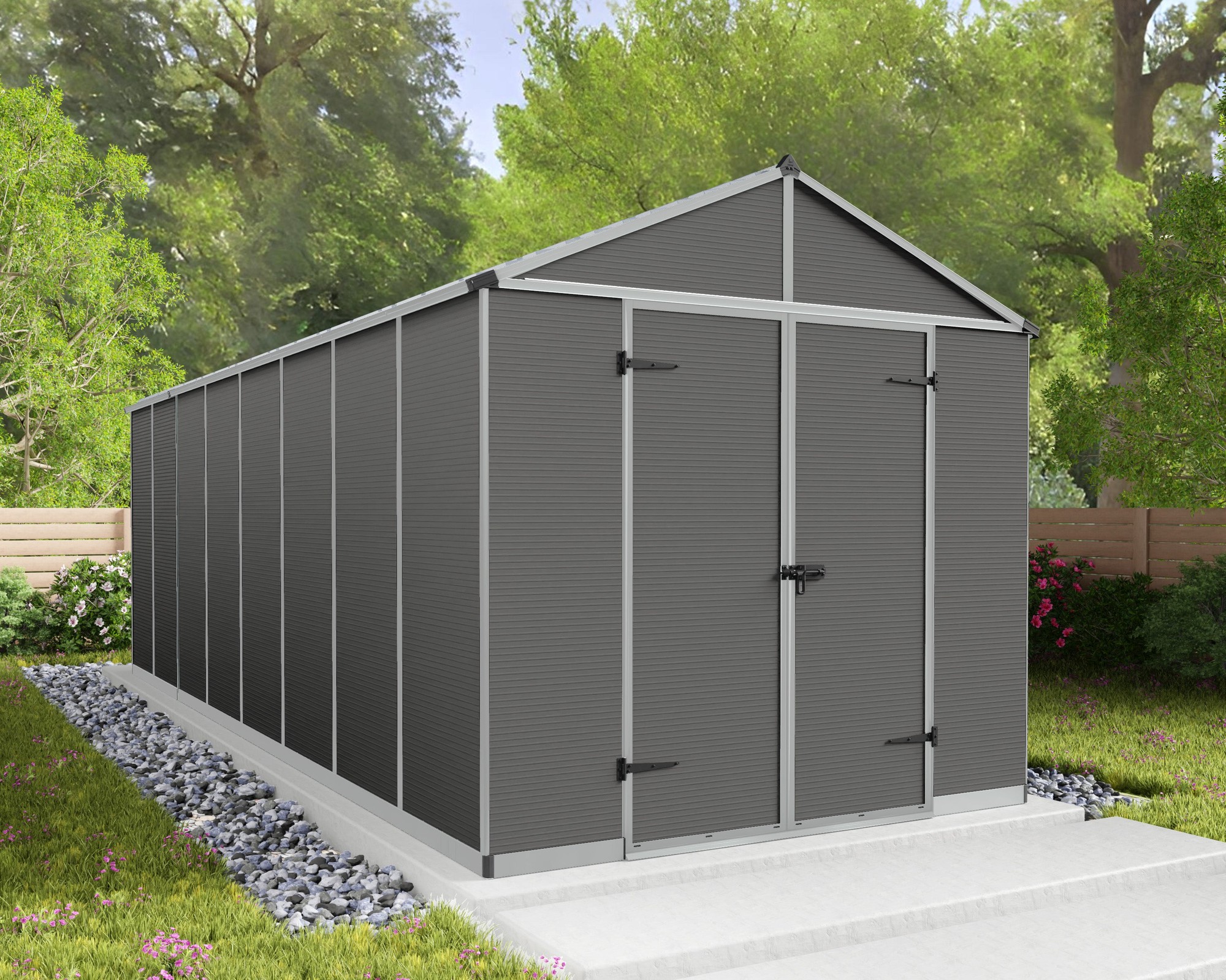 Dark grey, ultra-resistant polycarbonate garden shed with a sloped roof, double doors, and metal frame, set on a stone foundation surrounded by greenery.