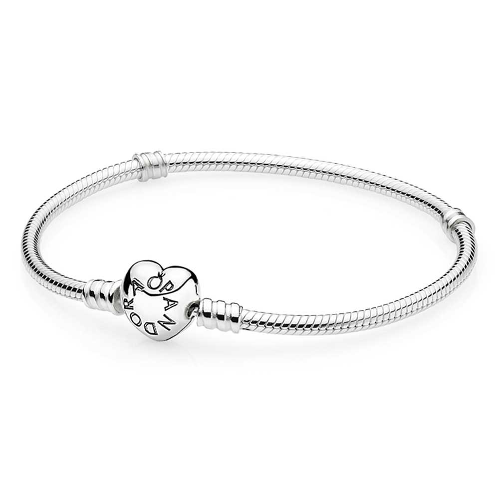 Pandora Moments silver bracelet featuring a heart-shaped clasp with engraved "Pandora" logo, crafted from sterling silver, measuring 18cm in length.
