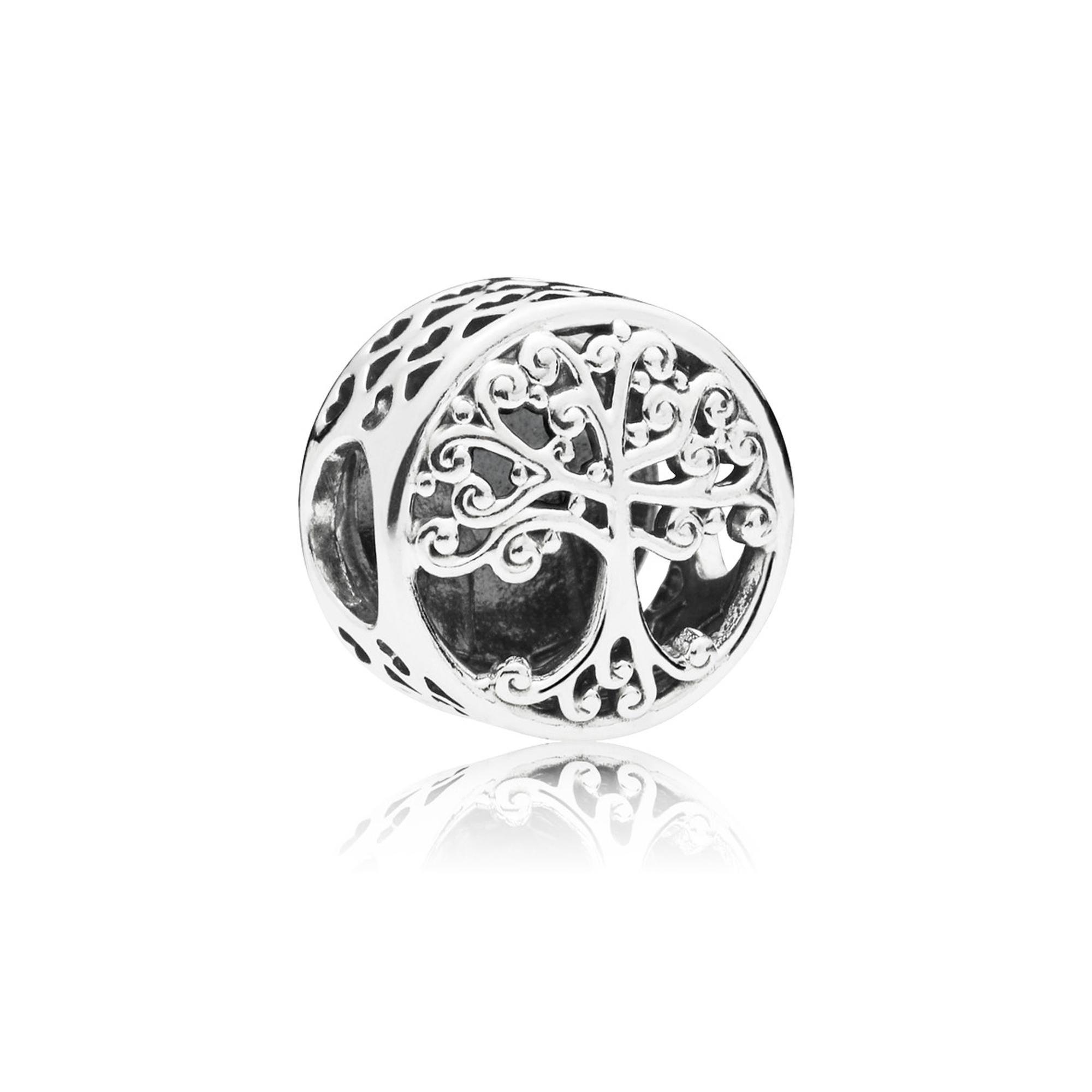 Silver charm featuring an intricately designed tree of life, showcasing swirling branches and leaves, with a polished finish and an oval shape.