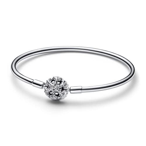 Silver bracelet featuring a sparkling snowflake clasp, showcasing intricate detailing and a sleek, minimalist design.