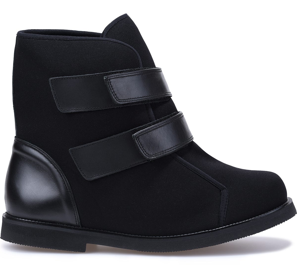 Black ankle boots featuring a soft fabric upper, dual adjustable Velcro straps, and a sleek black leather heel for added support and comfort.