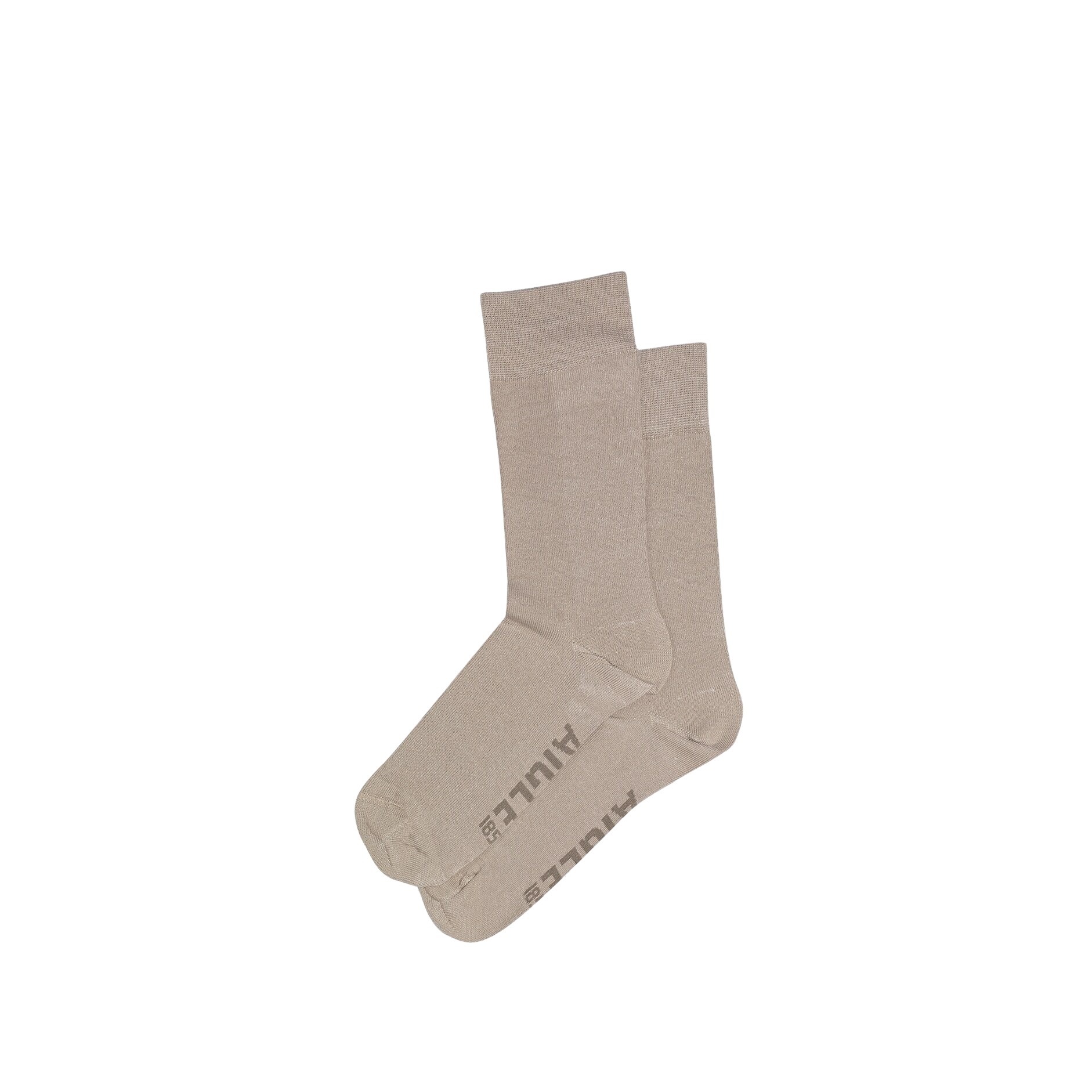 Beige plain cotton socks with a soft texture, featuring a subtle Aigle logo printed in gray on the side, made in France.