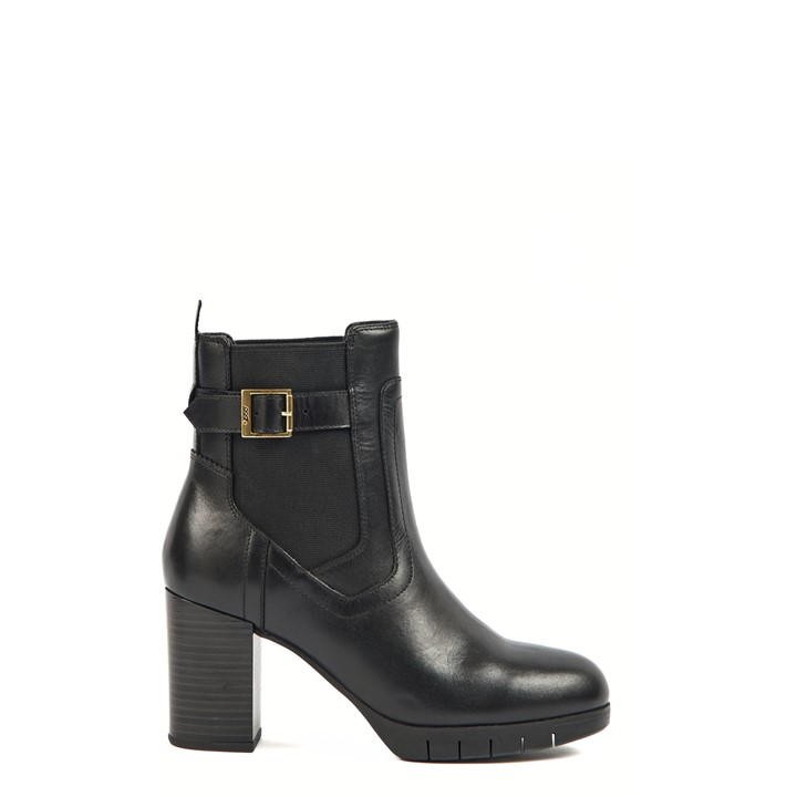 Black leather ankle boot with a chunky heel, featuring a side buckle detail and elastic panels for easy wear.