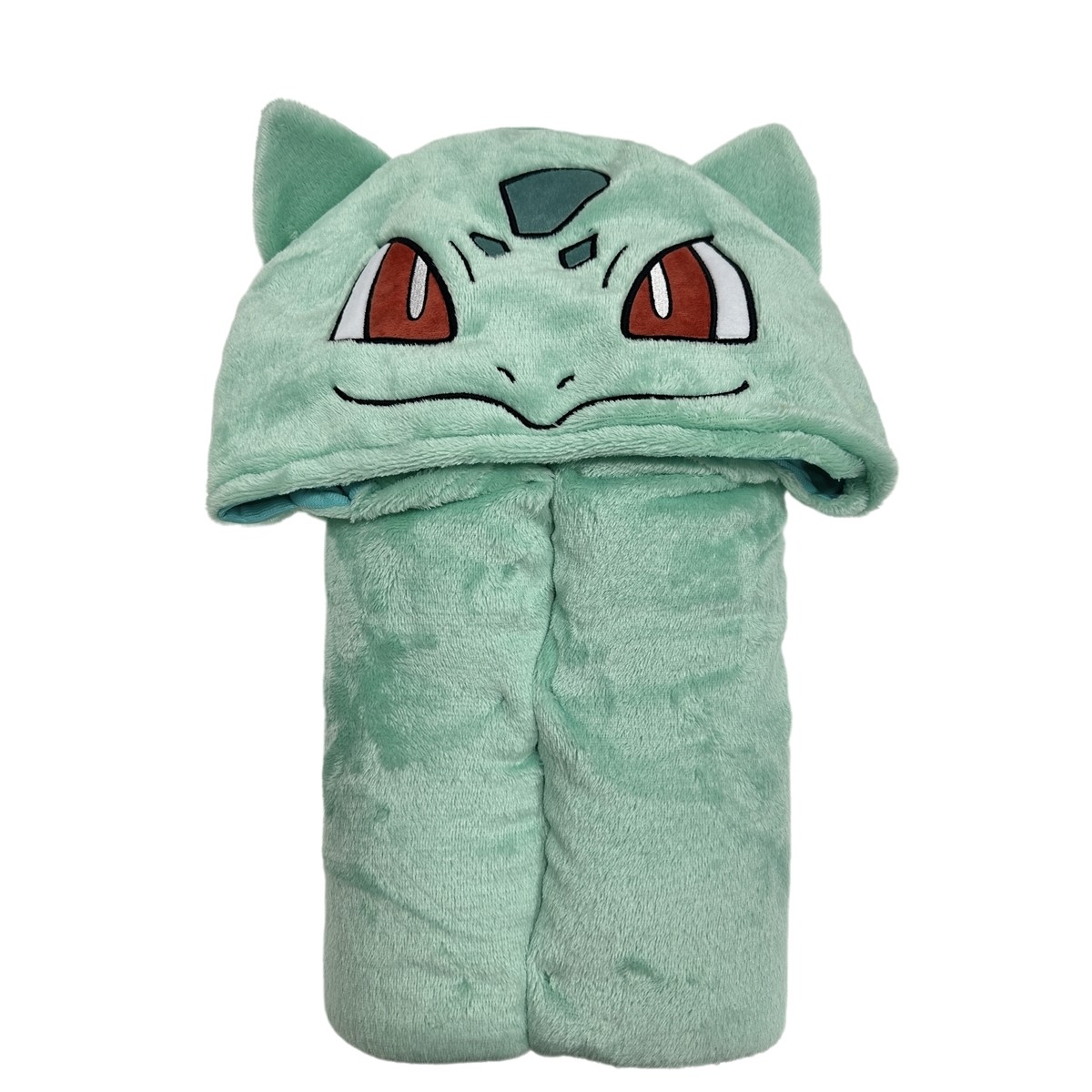 Soft mint green hooded blanket featuring Bulbasaur's face, with large red eyes and pointed ears, made from plush material for warmth and comfort.