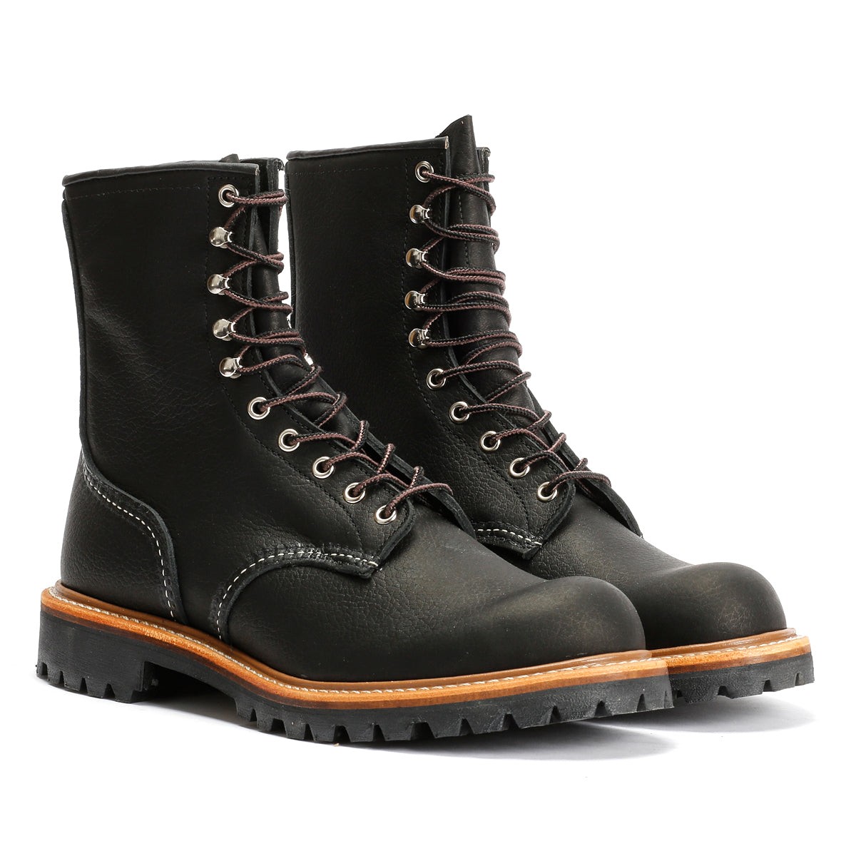 Black 8-inch logger boots made of oil leather, featuring metal eyelets, brown laces, a rugged rubber sole, and contrasting tan stitching along the midsole.