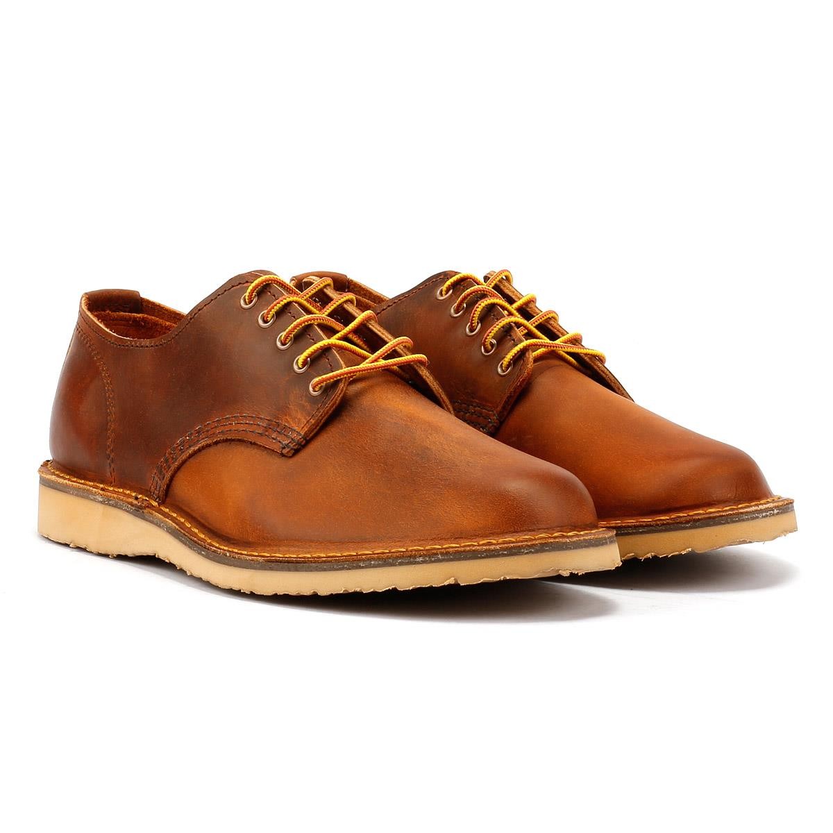 Men's Red Wing Weekender Oxford shoes in rough and tough copper leather, featuring yellow laces and a light-colored rubber sole.