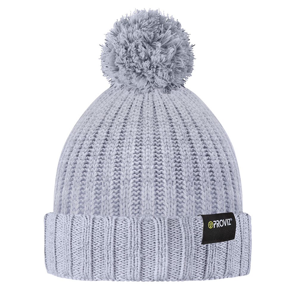 Light gray bobble beanie with a fluffy pom-pom on top, featuring a ribbed texture and a black Proviz logo tag on the cuff.