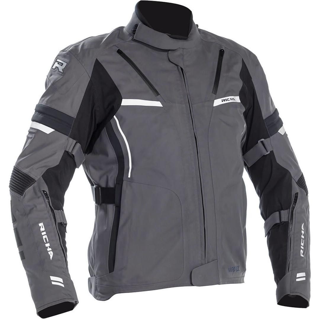 Grey Richa Arc Gore-Tex motorcycle jacket in size 6XL, featuring black accents, reflective strips, adjustable straps, and a sleek, durable design suitable for riding.