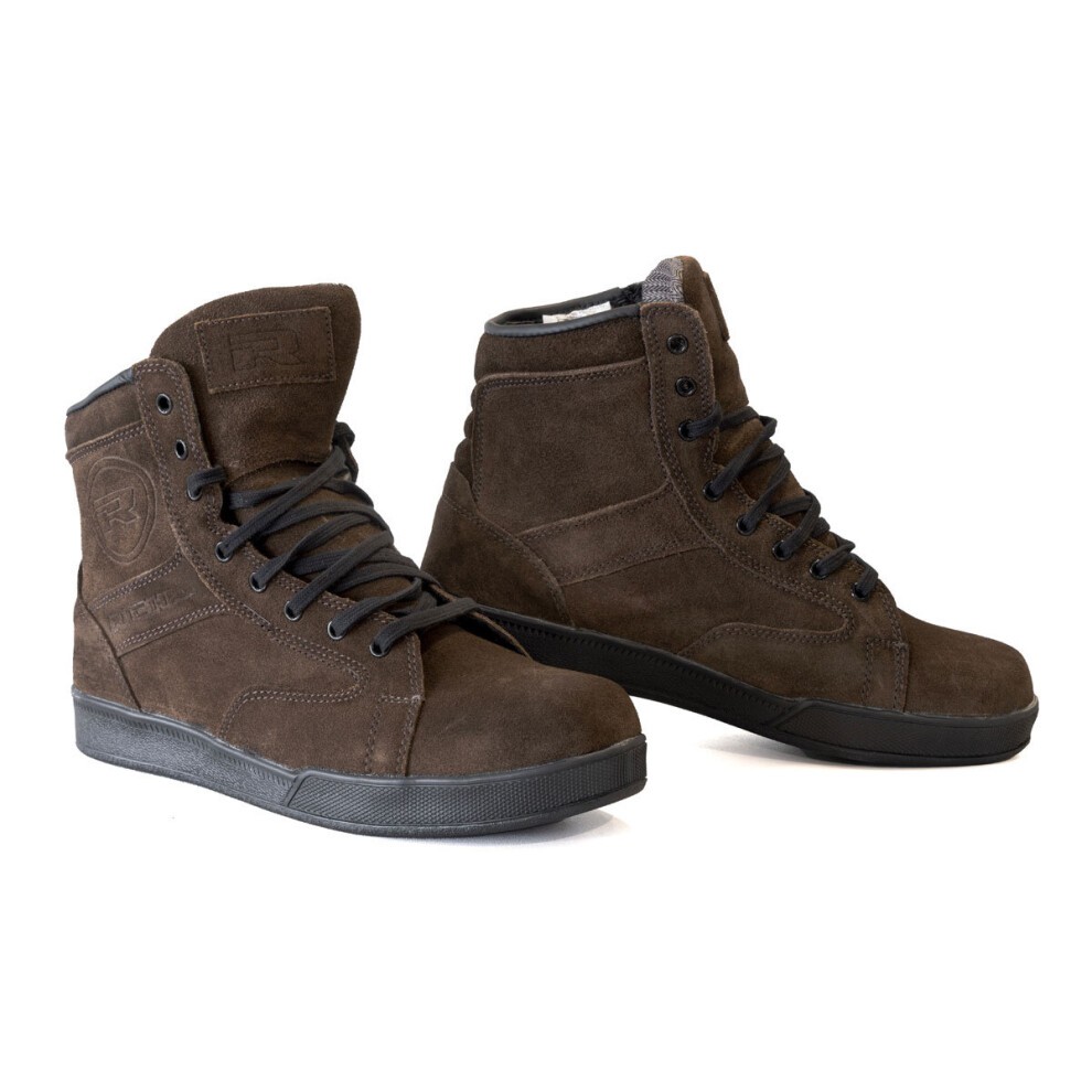 Brown suede motorcycle boots with black rubber soles, featuring a high-top design, lace-up front, and a logo patch on the side, sized 45 (UK 11).