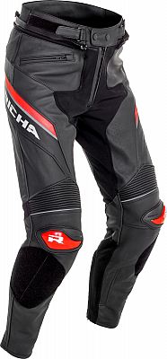 Black leather motorcycle trousers with red accents, featuring a high waist, zip closure, and padded knee protection, designed for street riding by Richa.