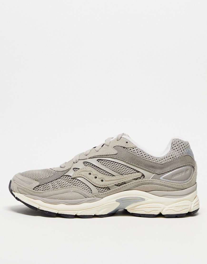 Grey Saucony Progrid Omni 9 women's shoes in size 6.5, featuring a mesh upper, cushioned sole, and sleek design for comfort and support.