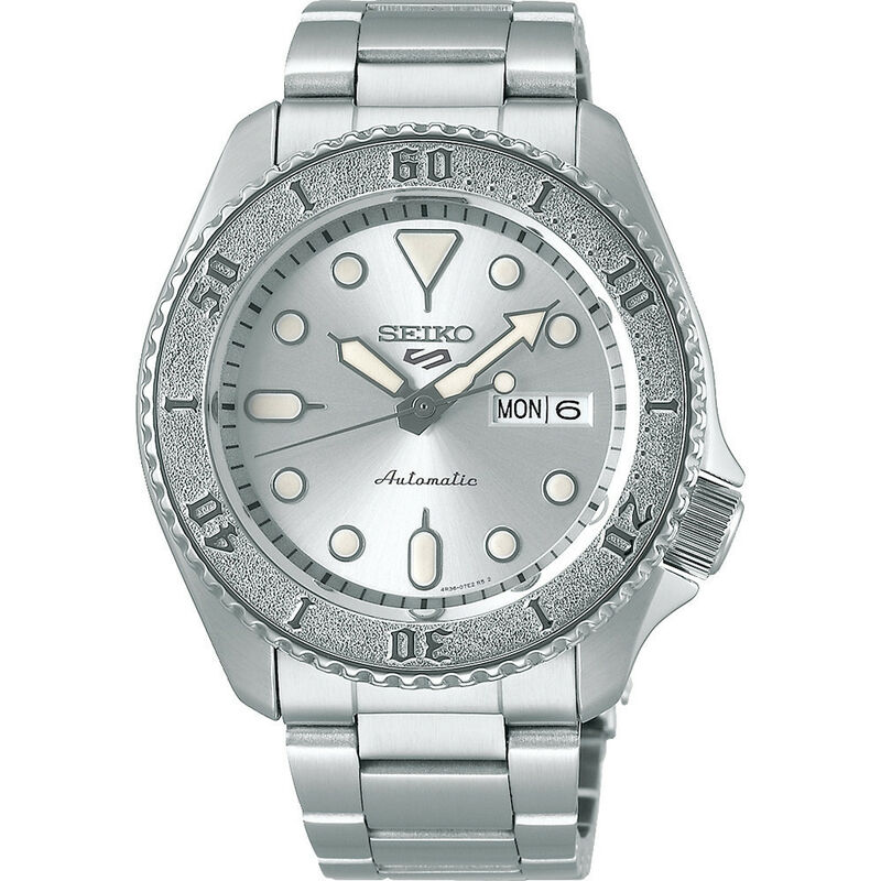 Seiko 5 Sports SRPE71K1 men's automatic watch features a 42.5mm silver dial, stainless steel bracelet, luminous hands, and a day-date display at 3 o'clock.