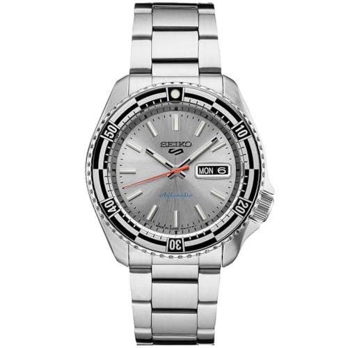 Seiko 5 Sports SRPK09K1 features a silver dial with black and orange accents, stainless steel case and bracelet, and a rotating bezel with a date display at 3 o'clock.