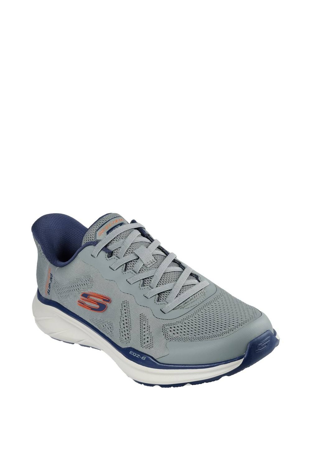 Skechers Men Equalizer 6.0 Trainer in green features a breathable mesh upper, cushioned sole, and contrasting navy accents for a sporty look.