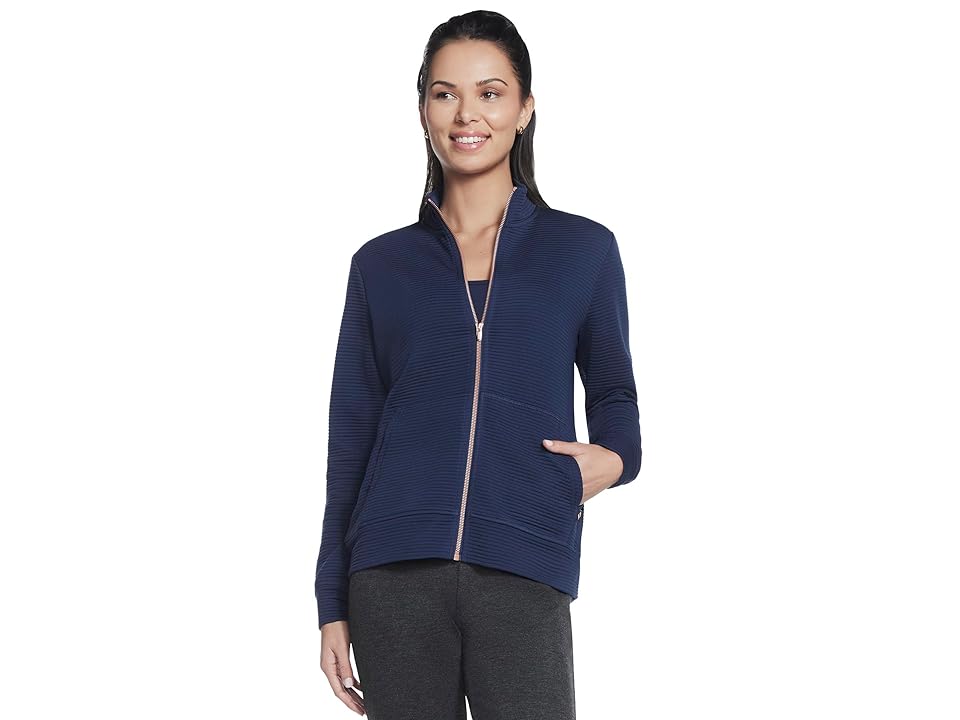Navy blue zip-up jacket with a textured fabric, featuring a high collar, side pockets, and a relaxed fit, designed for comfort and versatility.