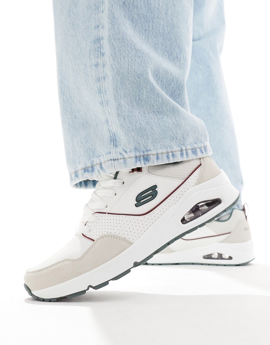 Skechers Men's Uno - Retro One Trainer features a white and grey design with perforated detailing, a cushioned sole, and a signature "S" logo on the side.