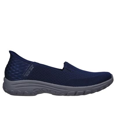 Navy slip-on shoe with a textured upper, elastic side panels for easy wear, and a cushioned gray sole, designed for comfort and casual style.