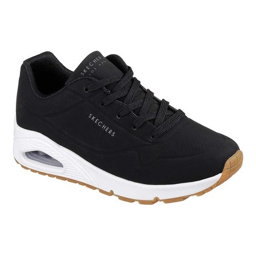 Black Skechers UNO Stand on Air trainers for women featuring a lightweight design, lace-up front, cushioned sole, and a contrasting white midsole with a gum rubber outsole.