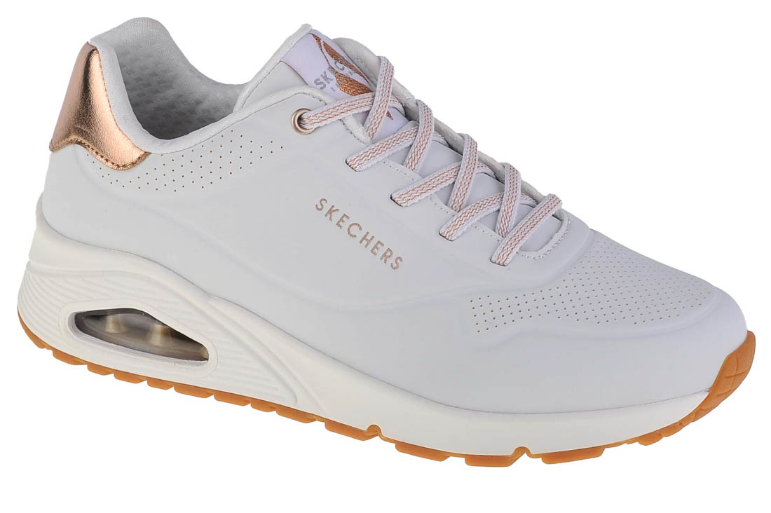 White Skechers Women's Uno - Shimmer Away Trainer featuring a sleek design, rose gold accents, breathable perforations, and a cushioned sole with a visible air unit.