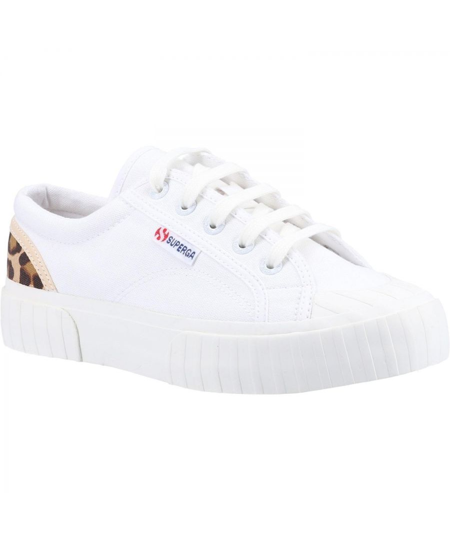 White canvas sneakers with a leopard print heel accent, featuring a textured rubber sole and classic lace-up design, branded with a small Superga logo.