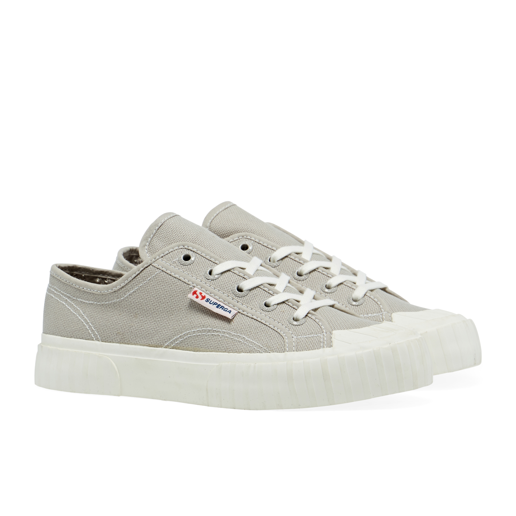 Grey canvas trainers with white laces, featuring a striped design and a chunky white rubber sole, branded with a small red and blue Superga logo on the side.