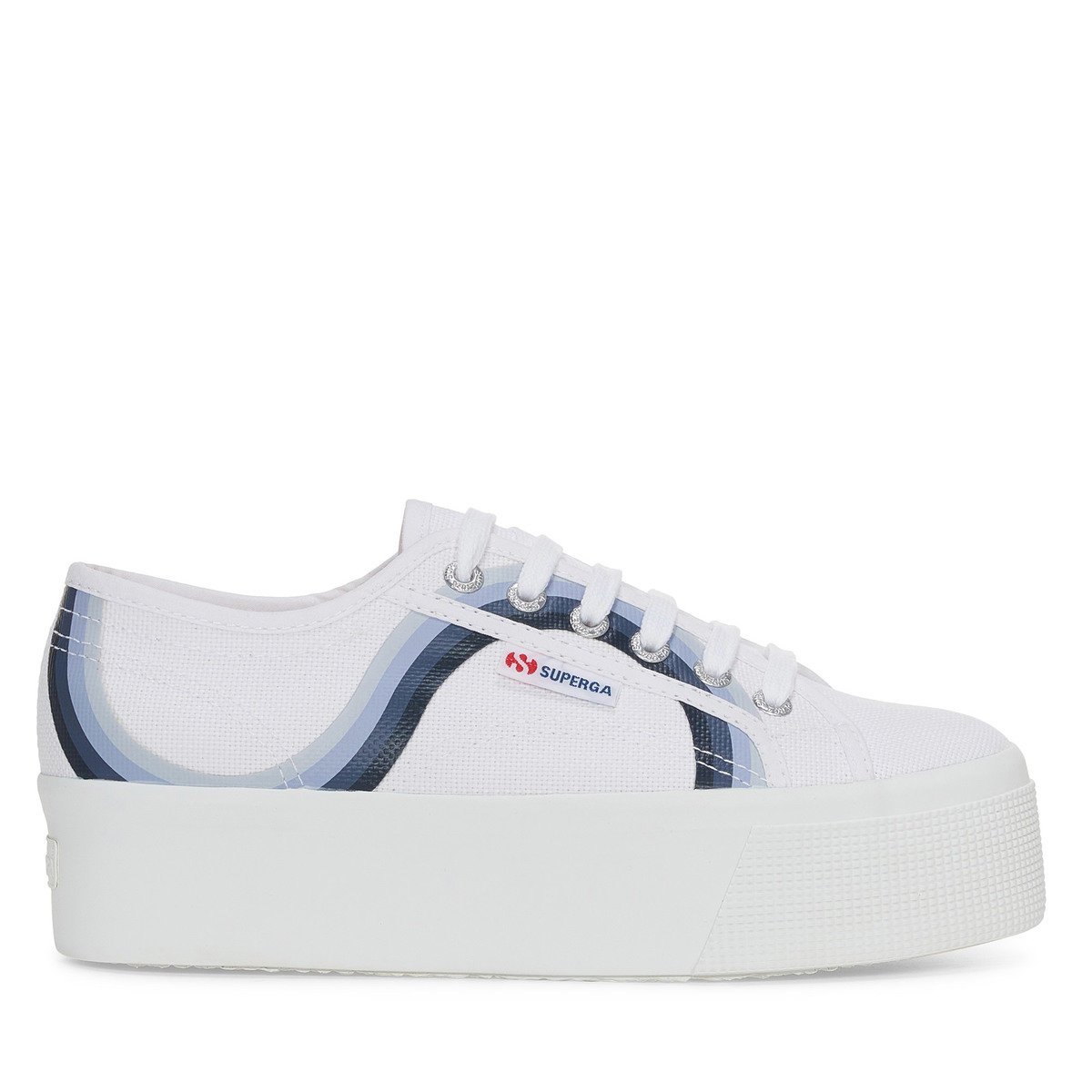 White canvas trainers with shaded blue stripes, featuring a thick white platform sole and classic lace-up design, branded with the Superga logo on the side.
