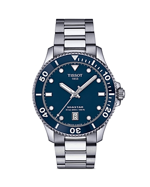 TISSOT Seastar 1000 men's watch features a 40mm stainless steel case, blue dial with luminous markers, unidirectional bezel, and a stainless steel bracelet.