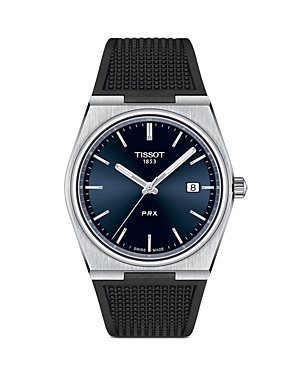 TISSOT PRX men's watch features a 40mm stainless steel case, blue dial with silver hour markers, date display, and a black rubber strap.
