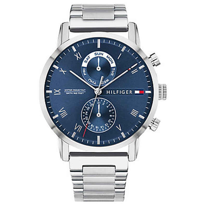 Silver stainless steel men's watch featuring a dark blue dial, three sub-dials for day, date, and 24-hour time, and a polished bracelet band.