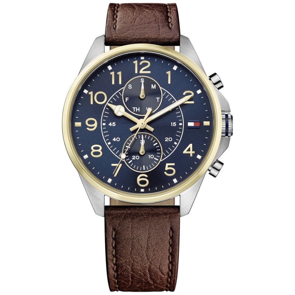 Men's Tommy Hilfiger Dean watch featuring a 46mm blue dial, gold-tone hour markers, sub-dial, and a brown leather strap with a textured finish.