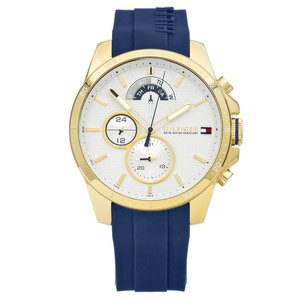 Men's Tommy Hilfiger Decker watch featuring a 48mm white dial, gold-tone case, blue silicone strap, and multifunction sub-dials for date and time tracking.