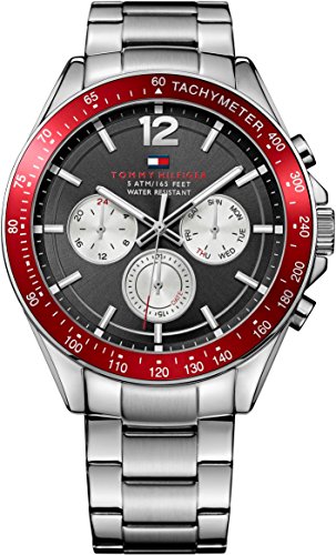 Men's Tommy Hilfiger multi-function watch featuring a 46mm grey dial, red bezel, stainless steel bracelet, and three sub-dials with a tachymeter scale.