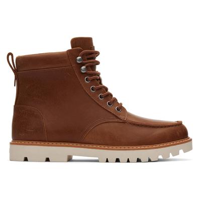 Water-resistant tan leather boot with a rugged sole, lace-up front, and pull tab at the back, featuring a classic design ideal for outdoor wear.
