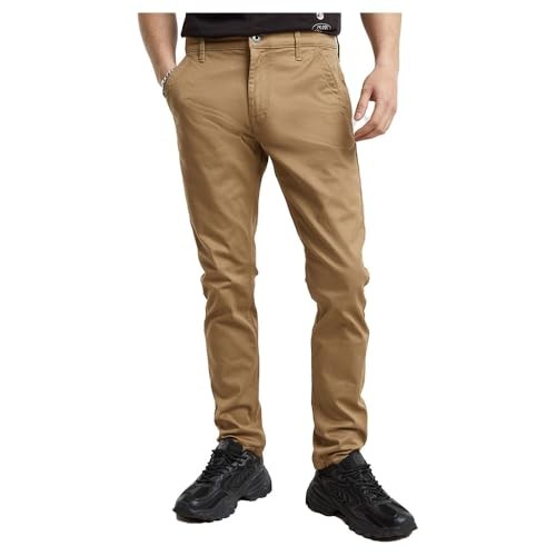 Tan G-Star Chino 3.0 trousers made of lightweight cotton, featuring a slim fit, five-pocket design, and a subtle logo on the waistband, paired with black sneakers.