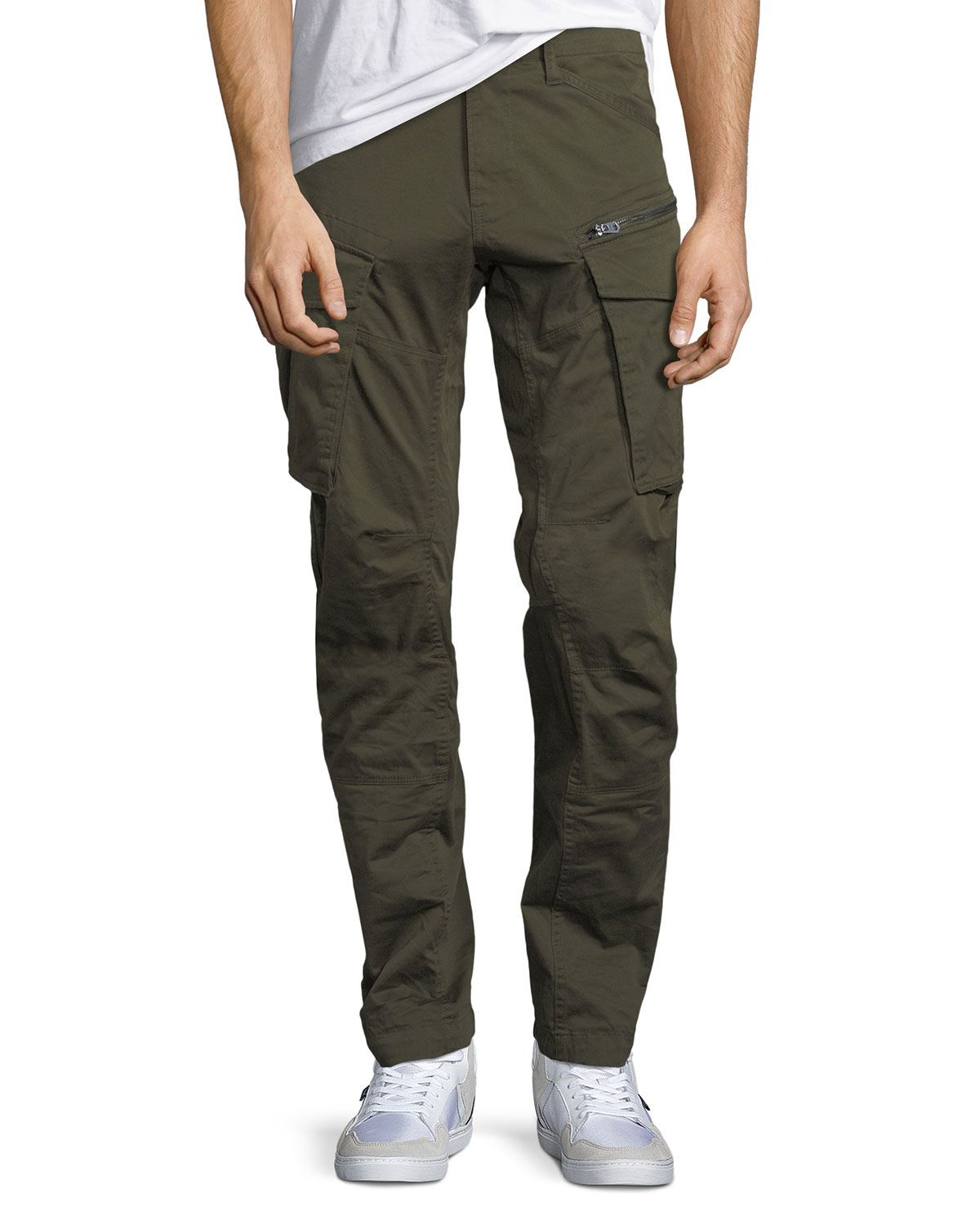 Olive green tapered trousers with a regular fit, featuring zippered pockets and cargo-style side pockets, crafted from durable fabric for a stylish, functional look.