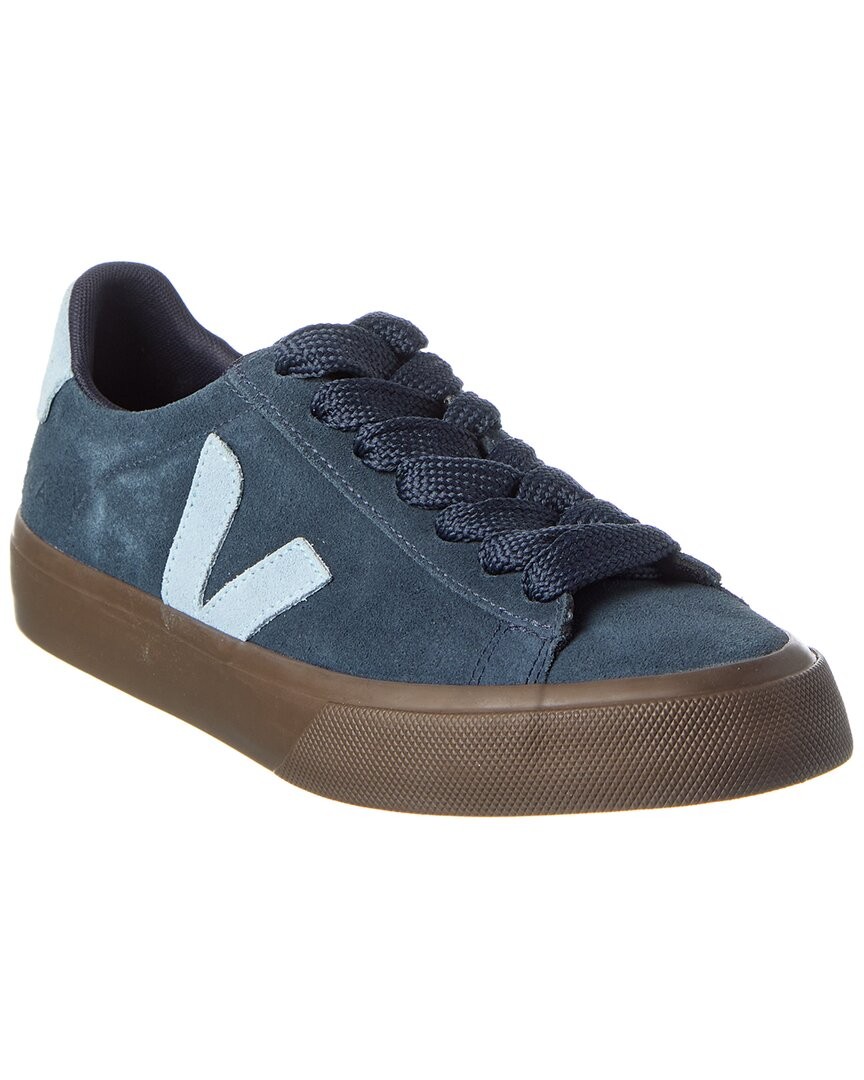 Navy blue suede sneaker featuring a dark brown rubber sole, textured laces, and light blue "V" logo on the side.