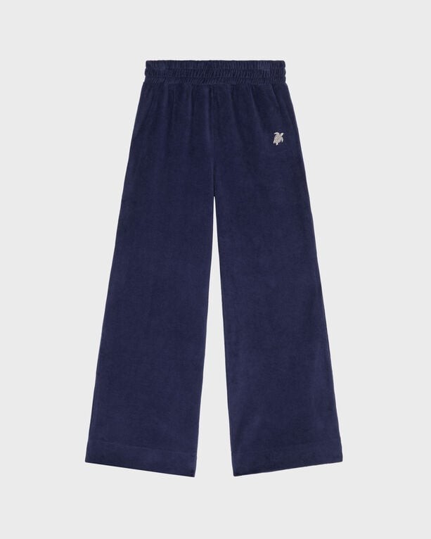 Blue velvet jogger pants for boys by Vilebrequin, featuring an embroidered turtle logo, with an elastic waistband and wide-leg design, size 4.