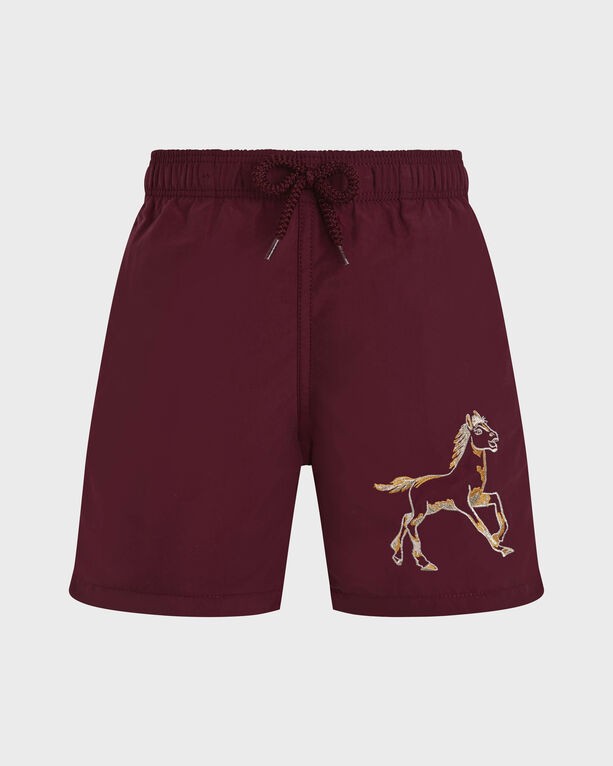Red swim shorts featuring an embroidered gold horse design, elastic waistband with drawstring, and lightweight material, designed for boys in size 4 by Vilebrequin.