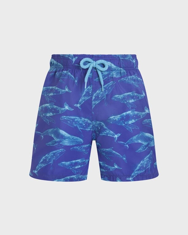 Boys' ultra-light blue swim shorts featuring a vibrant whale print, elastic waistband with a turquoise drawstring, and packable design, size 6 by Vilebrequin.