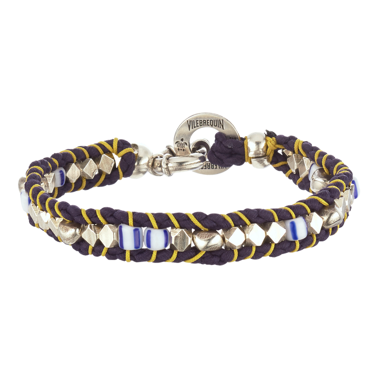 Blue and purple braided bracelet featuring silver and blue beads, with a clasp and Vilebrequin logo charm, designed in collaboration with Gas Bijoux.