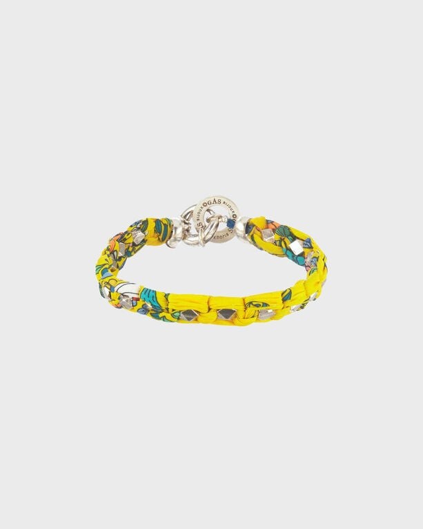 Yellow fabric bracelet featuring a vibrant turtle pattern, adorned with silver hardware and a logo charm, designed in collaboration with Gas Bijoux. Size 1.