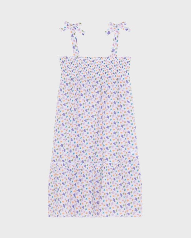 White organic cotton voile dress featuring a colorful floral print, adjustable tie straps, and a tiered hem, designed for girls in size 4 by Vilebrequin.