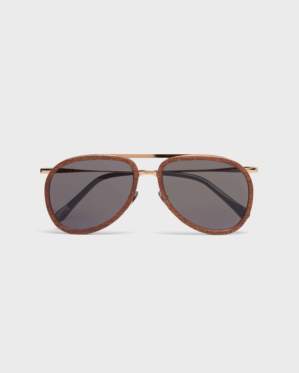 Mahogany wood aviator sunglasses with a pink tint, featuring a sleek gold metal bridge and dark grey lenses, designed for a stylish look.