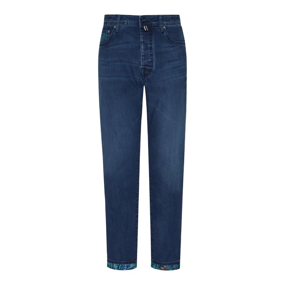 Blue denim pants with a five-pocket design, featuring tropical flower patterns on the cuffs, by Vilebrequin, size 38.