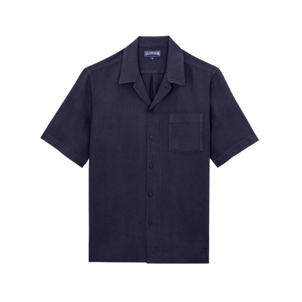 Short-sleeved, navy blue linen shirt featuring a button-down front, a single chest pocket, and a relaxed collar, designed for a casual yet stylish look.