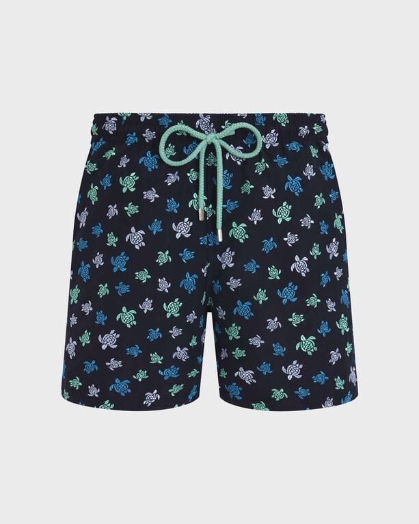 Blue swim shorts featuring an embroidered turtle pattern in white, green, and light blue, with an elastic waistband and drawstring, made from lightweight material, size 4XL.