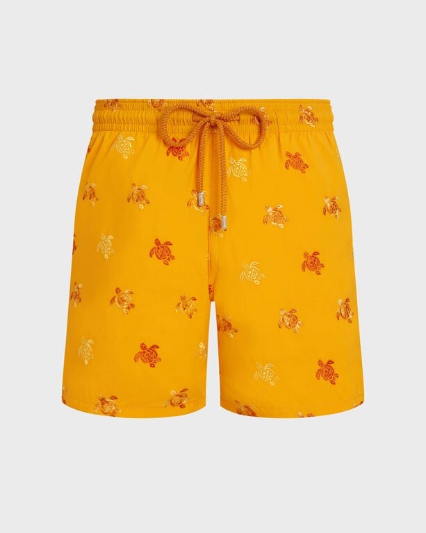 Orange swim shorts featuring embroidered tortoise designs, elastic waistband with drawstring, and a lightweight material, part of Vilebrequin's limited edition collection.